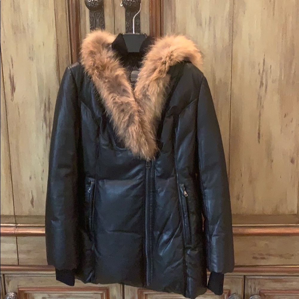 Mackage Lg. down/leather jacket w/raccoon collar.